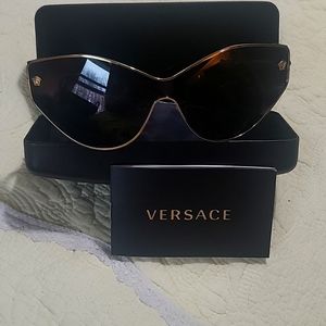 Versace sunglasses in box no scratches brand new great looking